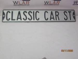 lot 74 image: VINTAGE CLASSIC CAR ST METAL SIGN&nbsp