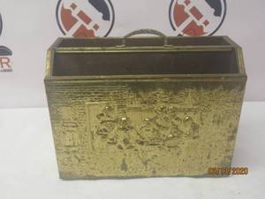 lot 101 image: VINTAGE LOMBARD BRASS EMBOSSED MAGAZINE PEASANT SCENE HOLDERSTORAGE&nbspMADE IN ENGLAND&nbsp