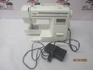lot 181 image: BROTHER XL 3030 SEWING MACHINE