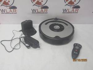 lot 209 image: IROBOT ROOMBA WITH CHARGING BASE
