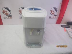 lot 275 image: OASIS COUNTER TOP WATER DISPENSER PER CLIENT WORKING WHEN PULLED FROM SERVICE