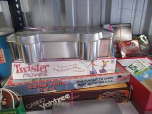 lot 7 image: FAMILY ENTERTAINMENT BOARD GAMES SCRABBLE, CASINO YATZEE, COLLECTOR EDITION MONOPOLY, DEAL OR NO DEAL, DVD TV GAME, TWISTER MOVES, CD MUSIC GAME, PLAYING CARDS AND MORE