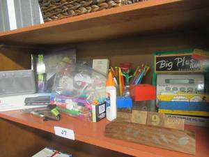 lot 26 image: OFFICE SUPPLYS INCLUDING ACCO 2-3 HOLE PUNCH, KIRKLAND GLOSSY PHOTO PAPER 300 SHEET 4 X 6, OFFICE DEPOT CLEAR SHEETS AND CONTENTS OF SHELF