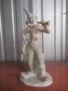 lot 43 image: PORCELAIN CIRCUS CLOWN 12 FIGURINE WITH ABC BLOCKS PLAYING TAMBOURINE AND HORN BY SEBASTIAN PAUL