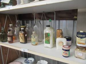 lot 83 image: COLLECTION OF OLD GLASS MEDICINE BOTTLES AND JARS GLASS MILK CONTAINERS AND MORE