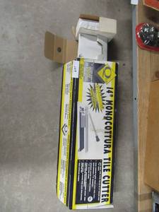 lot 109 image: 14 MONOCOTTURA TILE CUTTER WITH TITANIUM COATED CARBIDE CUTTING WHEEL AND  DECORATIVE TILE