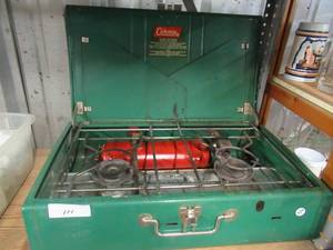 lot 111 image: COLEMAN 2 BURNNER STOVE MODEL 413G WAS MANUFACTURED FROM 1965-1969 MAKING THE ITEM A TRUE ANTIQUE
