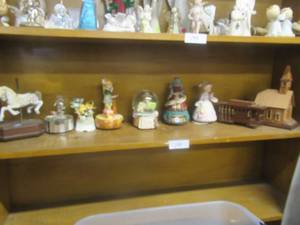 lot 178 image: MUSIC BOXES INCLUDES CHURCH, CABOOSE, CAT, 2 GIRLS, HORSE CAROUSEL. ALL ARE WIND UP MUSIC BOXES