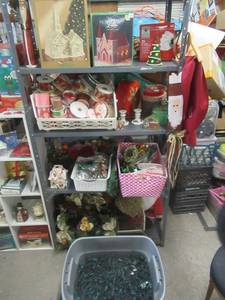 lot 190 image: CHRISTMAS DECORATIONS INCLUDING COLLECTIBLE PORCELAIN LIGHTED CHURCHES, HOME ACCENTS 24FT LENGTH LIGHTS, LARGE QUANTITY OF RIBBONS, WREATHS, CANDLESTICKS, LARGE CONTAINER OF TREE LIGHTS IN ROLLS AND MORE