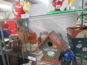 lot 193 image: OUTDOOR LOT INCLUDES BIRDHOUSE, PLANT WATERERS, HUMMINGBIRD FEEDER AND MORE