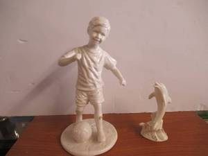 lot 199 image: LENOX BOY KICKING SOCCER BALL COLLECTIBLE AND LENOX DOLPHIN