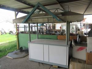 lot 275 image: OUTDOOR CABANA WITH LIGHTS AND HIDDEN DRAWER APPROX. 4 X 3