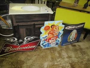 lot 278 image: 3 BUDWEISER TIN SIGNS INCLUDES BUDWEISER WITH EAGLE 41 X 16, GET WET BUD LIGHT 22 X 28 AND BUD LIGHT CERVEZA OFICIAL 24 X 24