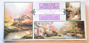 lot 8 image: Thomas Kinkade puzzle