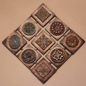 lot 143 image: Diamond shaped metal wall decor