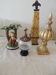 lot 33 image: Decor lot- metal tower, monkey sitting between palm trees glass ball with cross on top