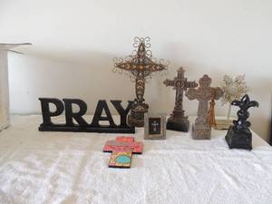 lot 37 image: Cross lot- Sandton cross with metal decor around outside orange in he middle 17x11, very heavy beaded cross 12x5 black glass tower cross 10x3 prayer sign 17x6 Hebrews 111 ross 8x6 and cross frame 4x5