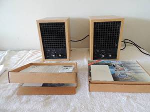 lot 38 image: Eco quest international made in USA air purifiers both work great comes with books and instructional video 3000 amp both electric new filter included