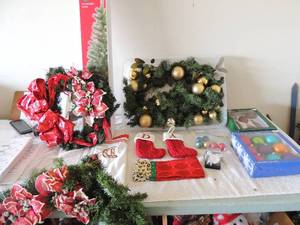 lot 42 image: Christmas lot 2 NIB 6-9 count colored Christmas bulbs, 2 mini stockings D &A greenery with gold bulbs 2 Christmas wreaths and a 4 tree comes in box