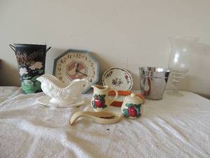 lot 43 image: 3 piece apple  creamer and sugar bowl with spoon holder gravy boat, duck clock, Syracuse peacock wall plate 8x8 wall mirror silver welcome bucket planter very large wine glass 18 high