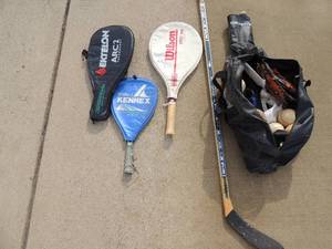lot 53 image: Easton baseball mit bat balls cones in caring case franklin gloves Wilson pro 110 tennis racket pro kennex mid size tennis racket ektelon tennis racket ccm heat hokey stick