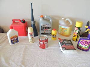 lot 88 image: Misc. lot 1 gal gas can, prestone anti freeze odor out hornet killer cheese cloth break fluid Glidden interior paint