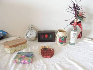 lot 109 image: Clay pot apple decor2 gift boxes vintage Danbury clock needs batteries, apple decor sign, barone firi wire bottle with lights inside
