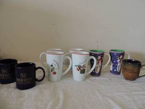 lot 124 image: 4 Fitz and Floyd hot chocolate mugs 3 Merritt homes coffee cups, 2 Gibson Christmas mugs and 2 Warf china coffee cups