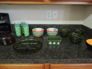 lot 131 image: 6 green dcor bowls Halloween bowls, 3 polka dot glasses green meat and cheese plate 1 qt. casserole dish with lid snowman square cracker dish