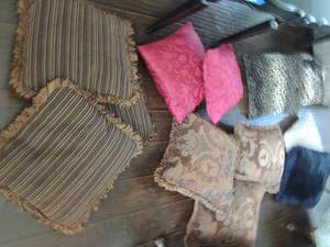 lot 142 image: large lot of decorative pillows maroon, brown stripe, leopard print black and white fuzzy pillows