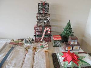 lot 15 image: Christmas lot-16 glass tree that lights up, wire 3 tier basket, lighted gift box, tree metal  yard Christmas art, hand knitted tree skirt and more