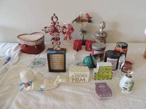 lot 26 image: Misc. Lot- crosses, candles and holders, Georgia bell, stackable blocks Sensy woman