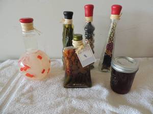lot 27 image: 5 glass jars with dcor food items for kitchen all by shofelds . Olives beans rice and peppers