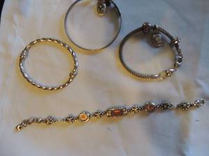 lot 193 image: Brighton x 4 bracelets   1 with message chain with barrel beads and chain