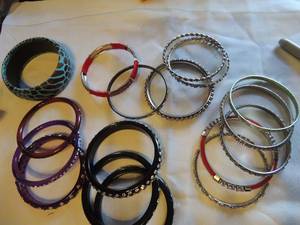 lot 196 image: Bangle bracelets x 17 some metal some plastic