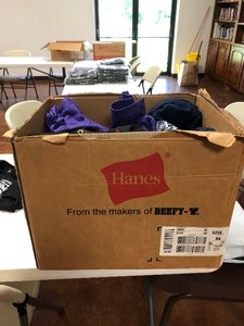lot 80 image: Large box of Christian T-Shirts