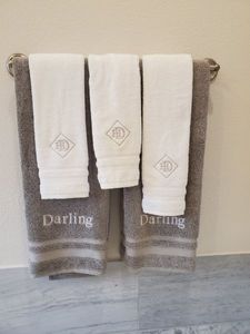 lot 140 image: Darling Homes Monogrammed Towels