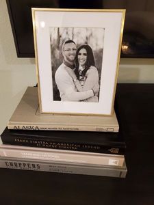 lot 218 image: Frame with 4 Books