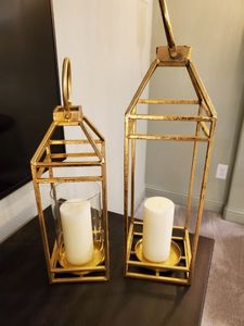 lot 219 image: Pair of Metal Candle Holders