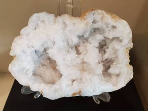lot 26 image: Geode on Stand & 3 Encyclopedias