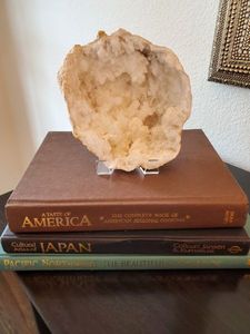 lot 29 image: Geode on Stand & 3 Books