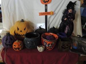 lot 47 image: Halloween lot- Plug in pumpkins, candy buckets, mickey candy bucket, NIP Batman costume, yard art and22 tall witch statue