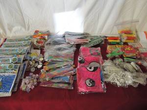 lot 48 image: Kids birthday favors- model paper planes, frog pencil bags with pencils, NIP,  blow up hammers, headbands, key chain flash lights and more.