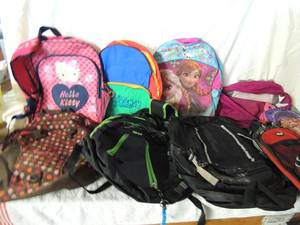 lot 60 image: School backpacks x10 used some plain some with cartoons.