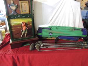 lot 67 image: Golf table for first place trophy included golf bag and clubs     home lynx lite