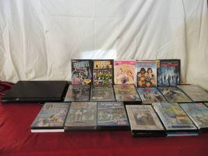 lot 72 image: 25 plus DVDs both childrens and action. Sony DVD player no remote