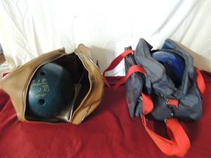 lot 74 image: 2 bowling balls in bags. 1 green ball in brown bag 0300 1 blue Ebonix Heidi