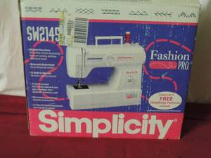 lot 75 image: Simplicity sewing machine in original box unknown working condition