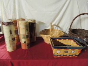 lot 76 image: 3 wicker baskets and 5 wine bottle holders new