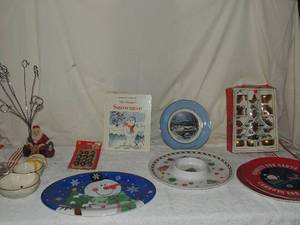 lot 88 image: Christmas - serving platters, snowman, double dip bowl, Christmas book, Santa family picture frame , incl. Avon  plate - by Wedgewood and more